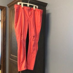 Plus sized coral colored jeans
